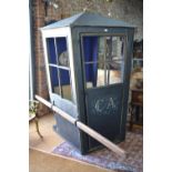 A 19th century style fabric covered sedan chair, the single door enclosing a blue lined interior and