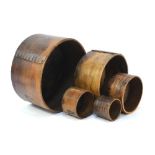 An antique graduated set of five birchwood cylindrical measures, Peck to half-pint all appear