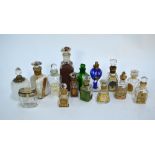 A collection of Victorian and later scent bottles with proprietory labels, to/w a blue flash