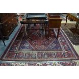 A Persian Joshagan carpet, 306 x 218 cm (worn overall)