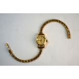 A lady's Longines 18ct gold wristwatch with 17-jewel movement no.11302019, on 9ct gold bracelet,