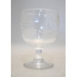 A large 19th century glass goblet engraved with a huntsman, horse, hounds and fox, short pedestal