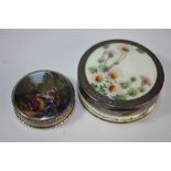 A silver and enamel pill-box with floral-painted decoration, London import 1911, to/w a smaller pill