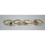 A cubic zirconia seven stone cluster ring, 9ct yellow gold claw set; cubic zirconia diamond shaped