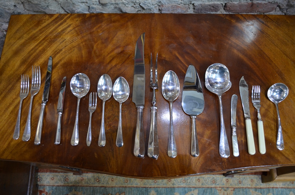 A figured mahogany canteen table with three fitted drawers, containing a part set of electroplated - Image 4 of 8