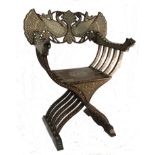 A late 19th century Italian Savonarola chair, extensively inlaid in bone and ebony
