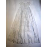 A Victorian cotton infant's Christening gown with tiered embroidery anglaise panel to front, a