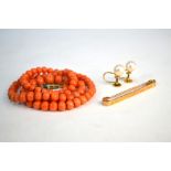 A single row of graduated antique coral beads to/w a pair of cultured pearl screw on earrings and