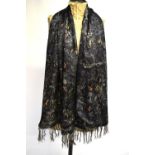 A Georgina Von Etzdorf 60 per cent cashmere and silk stole with abstract/figural design in orange/