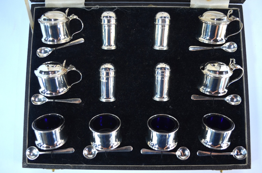 A cased twenty piece silver condiment set with blue glass liners including spoons, Birmingham 1938 - Image 6 of 11