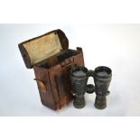 A pair of World War I German Fernglas 08 military binoculars, in leather case