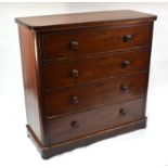 A Victorian mahogany chest, the top hinge-down drawer front enclosing four short linen slides over