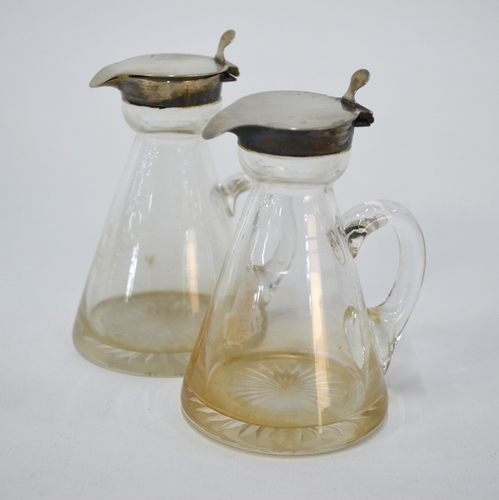 A pair of Edwardian conical glass whisky noggins with star-cut bases and silver collars and - Image 2 of 6