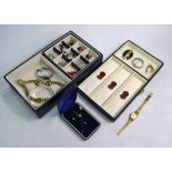 A quantity of mostly contemporary jewellery items in navy and cream jewel trays, including gilt