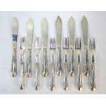 A set of six each silver fish knives and forks with unmarked loaded handles, the blades Walker &