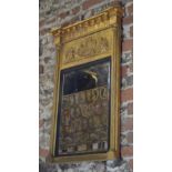 A Regency carved gilt wood and gesso framed pier glass with relief frieze cherub and chenet, 87 x 57