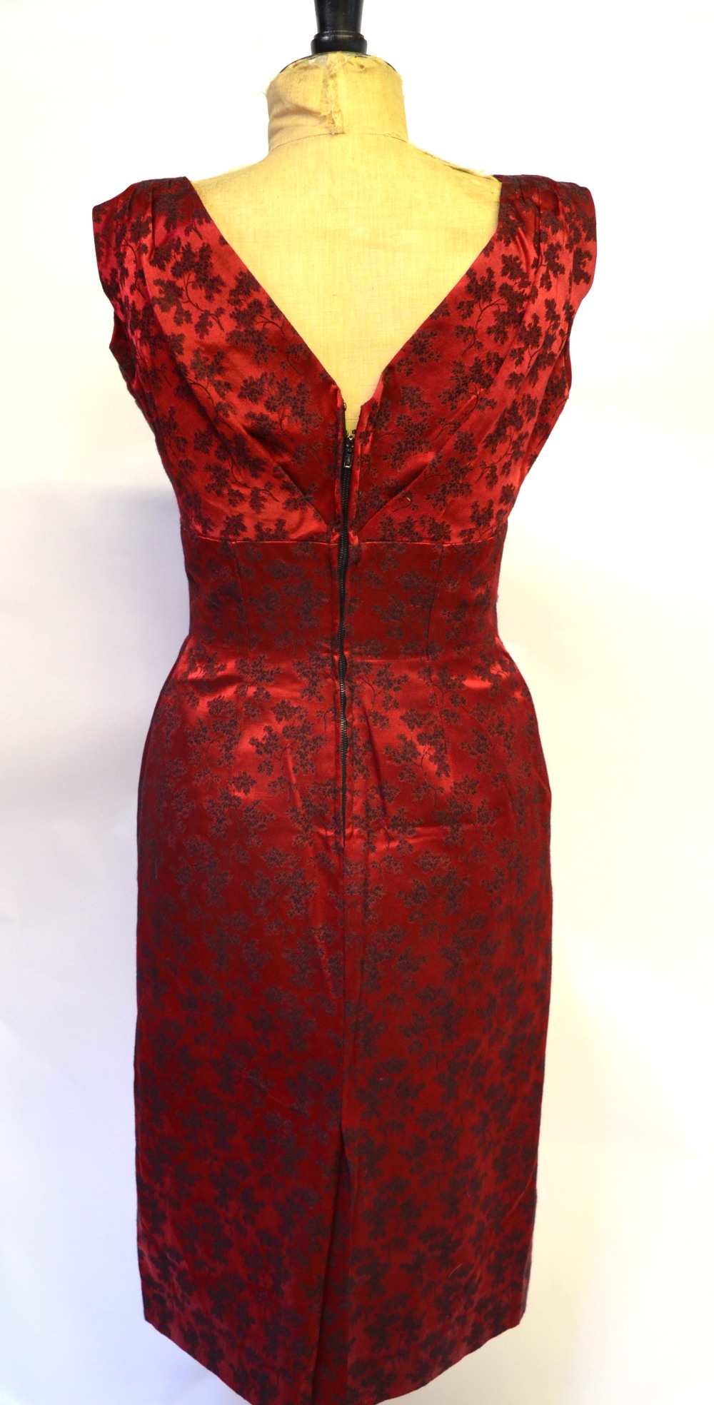 A 1940s red silk dress with black garland print, ruched waist falling to fringed drape, the belt - Image 4 of 4