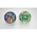 Two Paul Ysart paperweights -a 'Fountain' weight with multi-coloured scrambled millefiori and