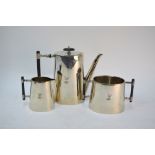 A late 19th century electroplated three-piece coffee service of oval tapering form, the ebony-rod