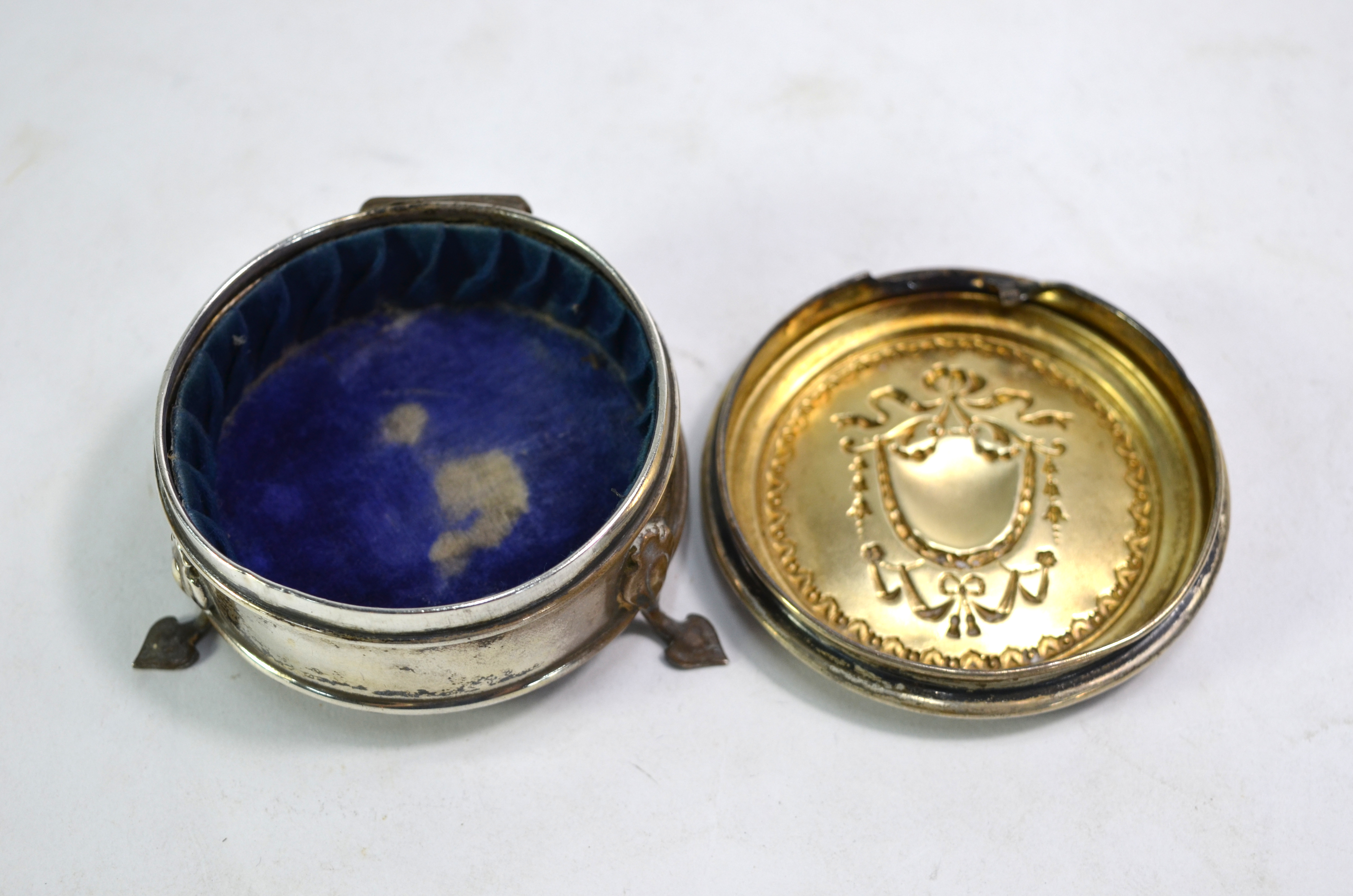 A circular silver ring-box, Birmingham 1911, to/w two American Sterling-overlaid scent bottles and - Image 6 of 11