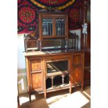 A late 19th century Sheraton Revival rosewood and inlaid mirror-backed cabinet, the upper part