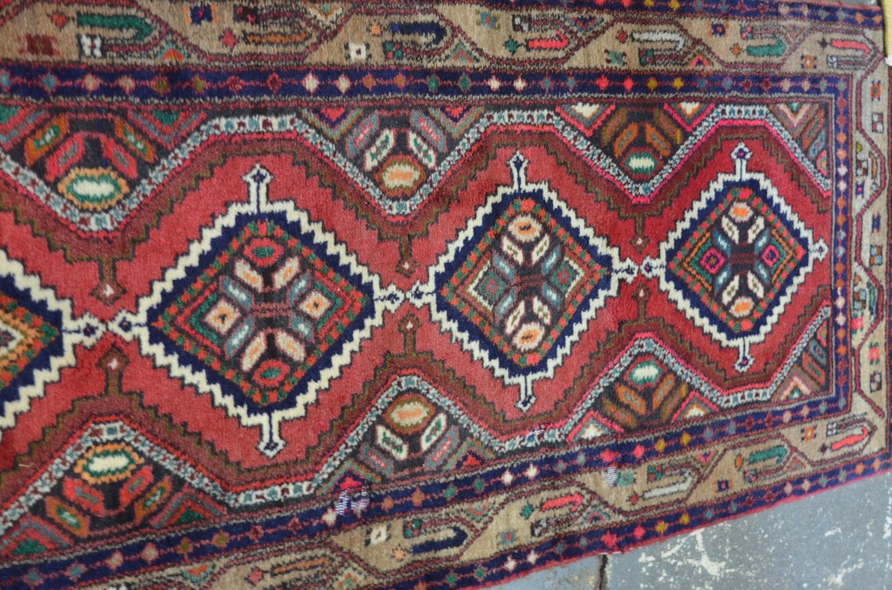 Persian Mazlegan runner, red ground geometric design, 279 x 78 cm