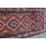 Persian Mazlegan runner, red ground geometric design, 279 x 78 cm