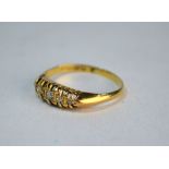 A five stone old cut diamond ring, 18ct yellow gold claw setting, size N 1/2