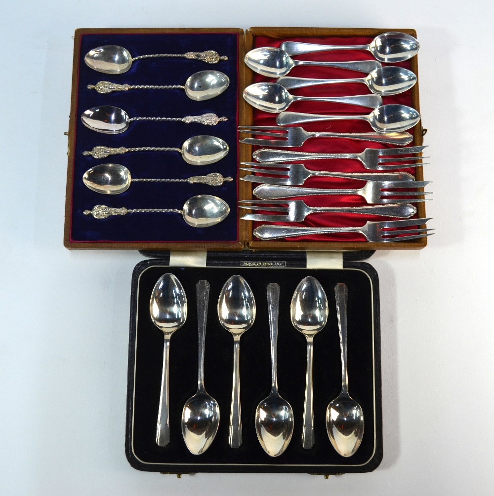 A late Victorian cased set of six silver coffee spoons with finials cast as British Boer War