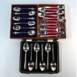 A late Victorian cased set of six silver coffee spoons with finials cast as British Boer War