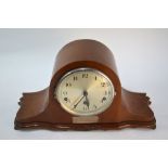A 1940s walnut cased eight-day three train mantel clock with Westminster chimes, bears