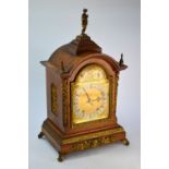 A large continental oak cased eight-day two train bracket clock, circa 1910, the Winterhalder &
