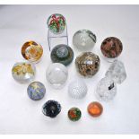 A collection of fifteen glass paperweights to include Waterford Crystal, Vigletta, Isle of Wight