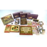 A quantity of vintage wooden jigsaws, to/w Peter Rabbit board game with pieces (box)