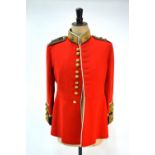 A vintage Coldstream Guards officers two piece scarlet dress uniform by C F Johns & Pegg, London,