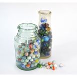 Two jars of old glass marbles