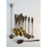 A set of six Norwegian silver gilt coffee spoons with plique a jour enamel finials and twist