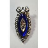 A Georgian elliptical rose diamond and blue enamel pendant, the blue enamel centrepiece set with two