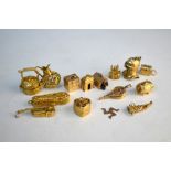 Fifteen various charms, thirteen of which are hinged, mostly 9ct, approx 55g all in
