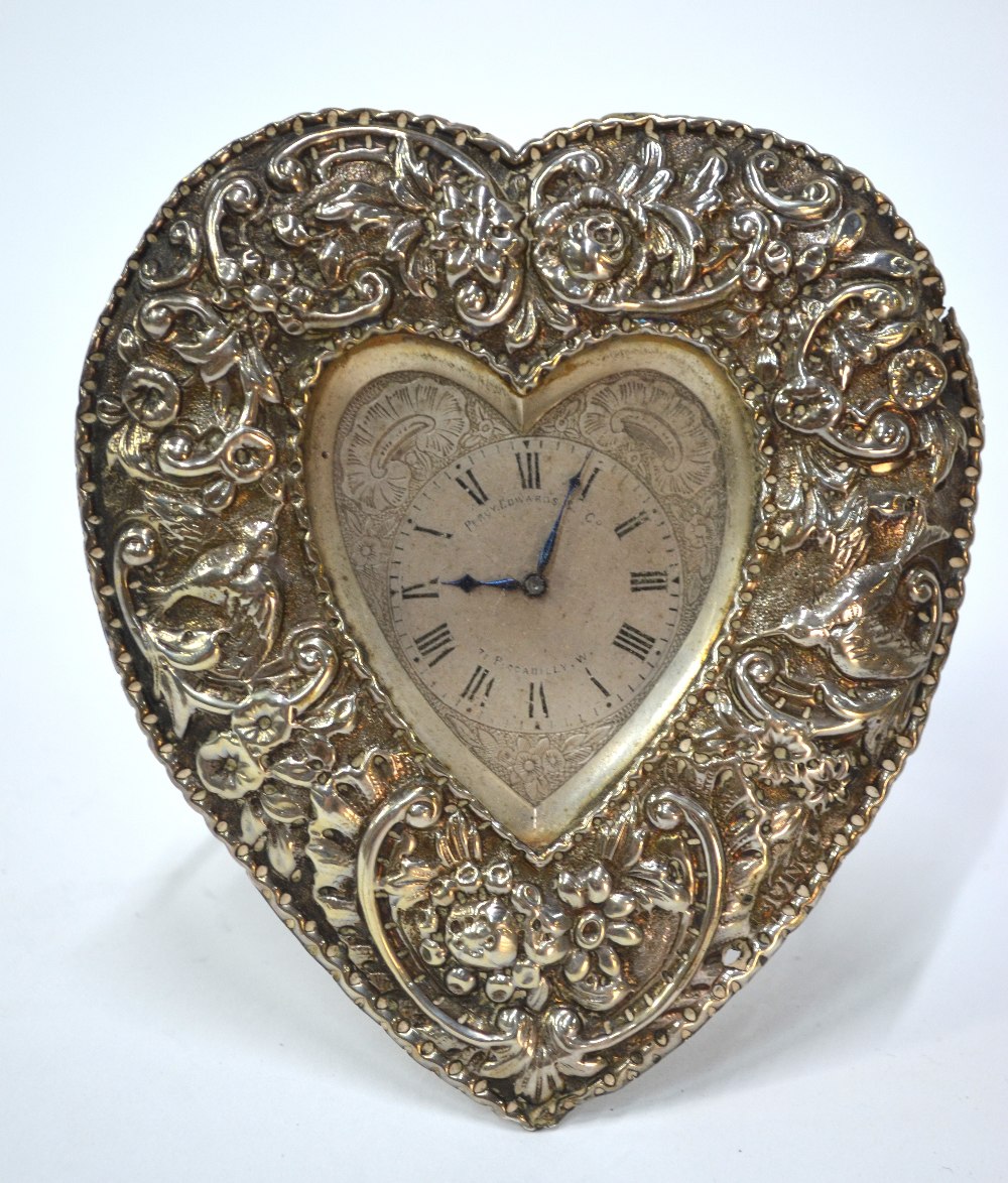 A Victorian embossed silver heart-shaped strut clock with engraved dial and Swiss movement, retailed - Image 5 of 7