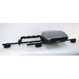 A Thule fishing rod roof rack system with locking box