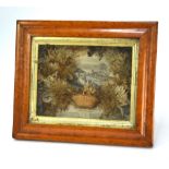 A Victorian 'Seaweed Basket' diorama, backed with an engraving of a seaside town above a poem, in