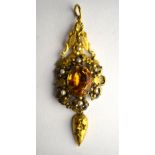 A Victorian drop style pendant having oval citrine in gilt metal closed back setting, with pearls