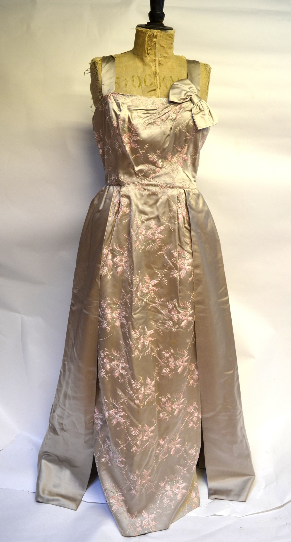 A 1950s ball gown oyster silk satin, floral and metallised thread brocade with structured bodice and