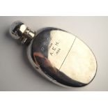 A Victorian silver hip flask with hinged screw cover and detachable beaker, Army & Navy