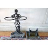 A cast Iron Art Nouveau two-division stick stand 71 cm high to/with a cast iron boot scraper (2)