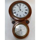A 19th century American inlaid walnut drop-dial wall clock with aneroid barometer below, 71 cm diam