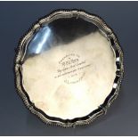 A silver letter salver with gadrooned rim, on scroll feet, J. Harris & Son, Birmingham 1966, 16.8