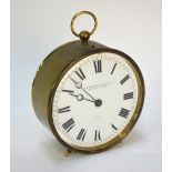 A brass drum cased clock with eight-day lever escapement movement and white enamelled dial signed