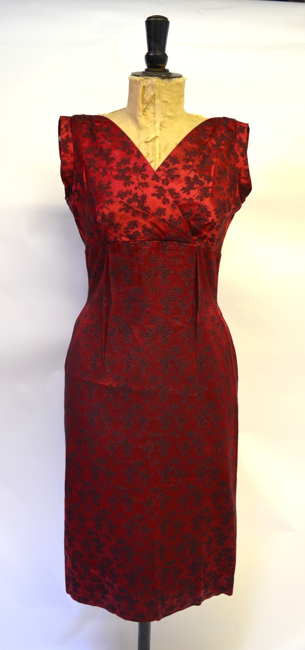 A 1940s red silk dress with black garland print, ruched waist falling to fringed drape, the belt - Image 3 of 4